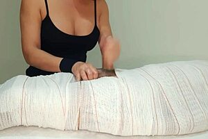 She Mummifies Him For A Handjob But Interrupts His Cum For Two Minutes In This Bdsm Session.
