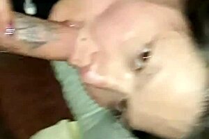 Brunette older woman kneels to suck Joshua Jisms massive BWC in Trick City, focusing on deepthroat techniques and swallowing every drop of cum from the big cock.