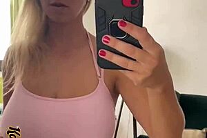 woman masturbates in mirror wearing sexy panties and socks