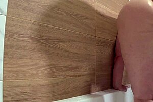 Hidden bathroom camera spies on plump mature wife showering her curvy pawg body