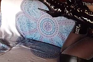 Petite brunette milf in sexy total black outfit with fishnets pantyhose and over-the-knee boots