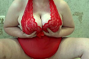 Oh man, this chubby milf with saggy tits is dominating herself, fingering that hairy pussy and stroking those big boobs in homemade fetish action