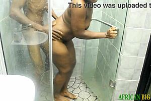 An african ebony woman engages in standing intimacy and invites subscriptions to her red channel for more content