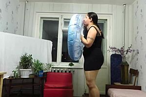 Milf engages in looner fetish by inflating beach circle