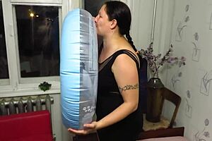 Milf engages in looner fetish by inflating beach circle