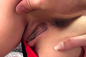 threesome with slutty brunette girl in lingerie and fishnets for anal finger and deepthroat on bed