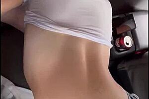 Streetwalker in wet t-shirt gives backseat blowjob and keeps sucking after cum in mouth