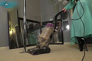 She vacuums the house while strutting in those tight hobble boots as a milf housewife.