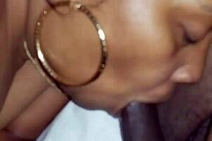 Gorgeous black milf craves that dick and balls in her blowjob session!