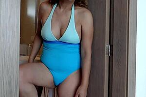 On the beach, my wife shows off looking for a man to join her, strips naked, and urinates.