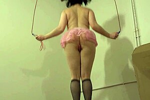 milf with sexy brunette hair inserts anal plug in asshole for amateur fetish jumping on rope