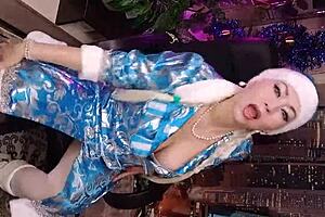 Aimee experiences a festive Christmas encounter with Santa Claus's member captured in intimate close-up detail.