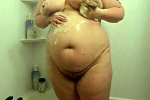 Did you see this hidden cam catching voyeur BBW milf soaking wet in shower?
