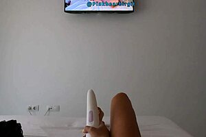 Milf watching her own lesbian porn video while playing with shaved pussy in bed. Using vibrator for orgasm... so hot! 🔥💦