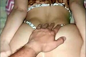 Big ass latina in bikini bends over for homemade doggystyle fuck from behind in casual amateur action.