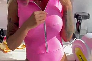 Luscious Monika Fox in Pink Bodysuit Undresses in Kitchen Showing Pierced Nipples