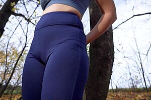 sexy girl teases her fat cameltoe pussy in tight yoga pants outdoors 😏