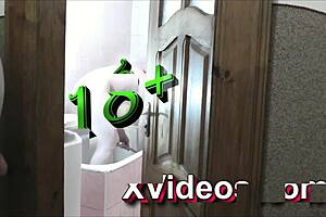 naked sexy blonde woman in bathroom without panties. Pervert man roommate watches outside masturbating cock for cumshot on old young 18+ wet pussy with natural tits.