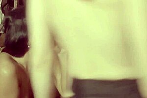 Three people gather in a haystack for a group activity involving bending over, riding, and kissing