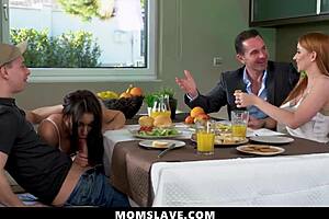 the stepfamily gathers for a relaxed session around the dinner table with momslave