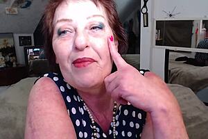 dawn sticks a dildo on chriss chin and rides it with her voluptuous body on display