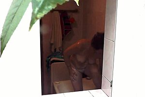 Neighbor guy watches my sexy mature wife shower naked outdoors with handjob.