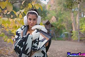 Awesome brunette milf Lena the plug reveals her amazing boobs outdoors