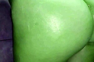 She transforms into She Hulk for homemade Halloween fun. Big green woman shows off green ass green feet and green pussy.