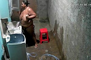 Hidden Camera Catches Busty Brazilian Neighbor Masturbating in Backyard While Voyeur Watches Intensely