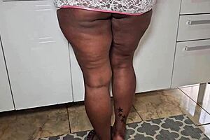 rabuda latina milf handles kitchen duties with her big ass and tits flashing