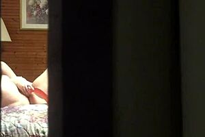 peeping tom spies hot amateur milf masturbating wildly in hotel room...