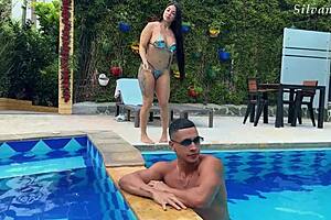 hey silvana lee looks so hot seducing that fitness guy by the pool with her curvy body!!