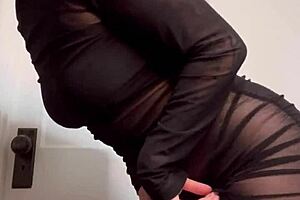 goddess ellie rowyn dances teasing in sheer black dress