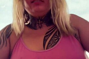 tattooed chick's hard nipples pop through see-through gym top