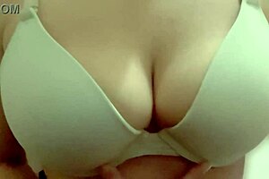 My busty tattooed neighbor milf plays with her huge tits outdoors.