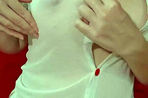 Blonde curvy amateur bounces huge fake tits in see-through dress closeup