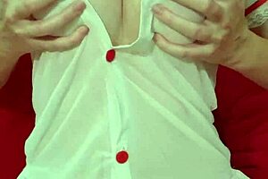 Blonde curvy amateur bounces huge fake tits in see-through dress closeup