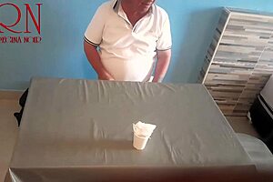 Naked waitress serves food from her navel to guest.