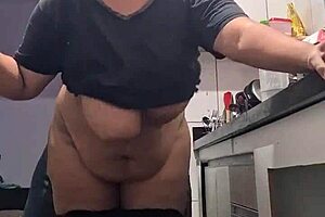 Thick stepmom cooks up taboo kitchen fun with stepson. Big tits bounce as she rides his monster cock cowgirl style.