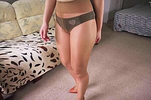 hot milf strips leggings and heels showing long legs upskirt tease