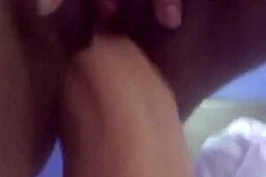 A mature milf enjoys solo play with her dildo.